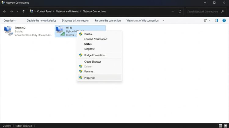 Masuk ke Network Connections dan klik kanan WiFi adapter